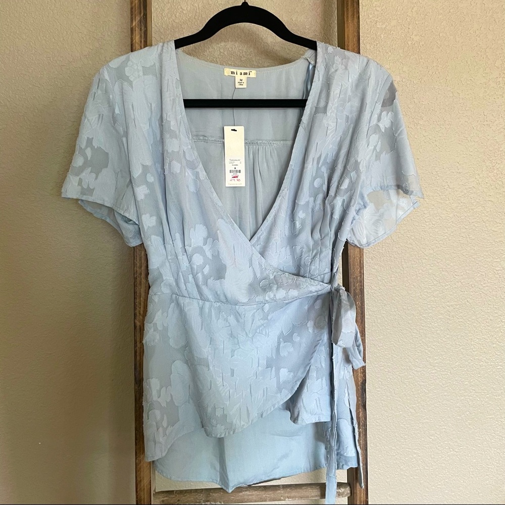 Wrap top blouse with floral design